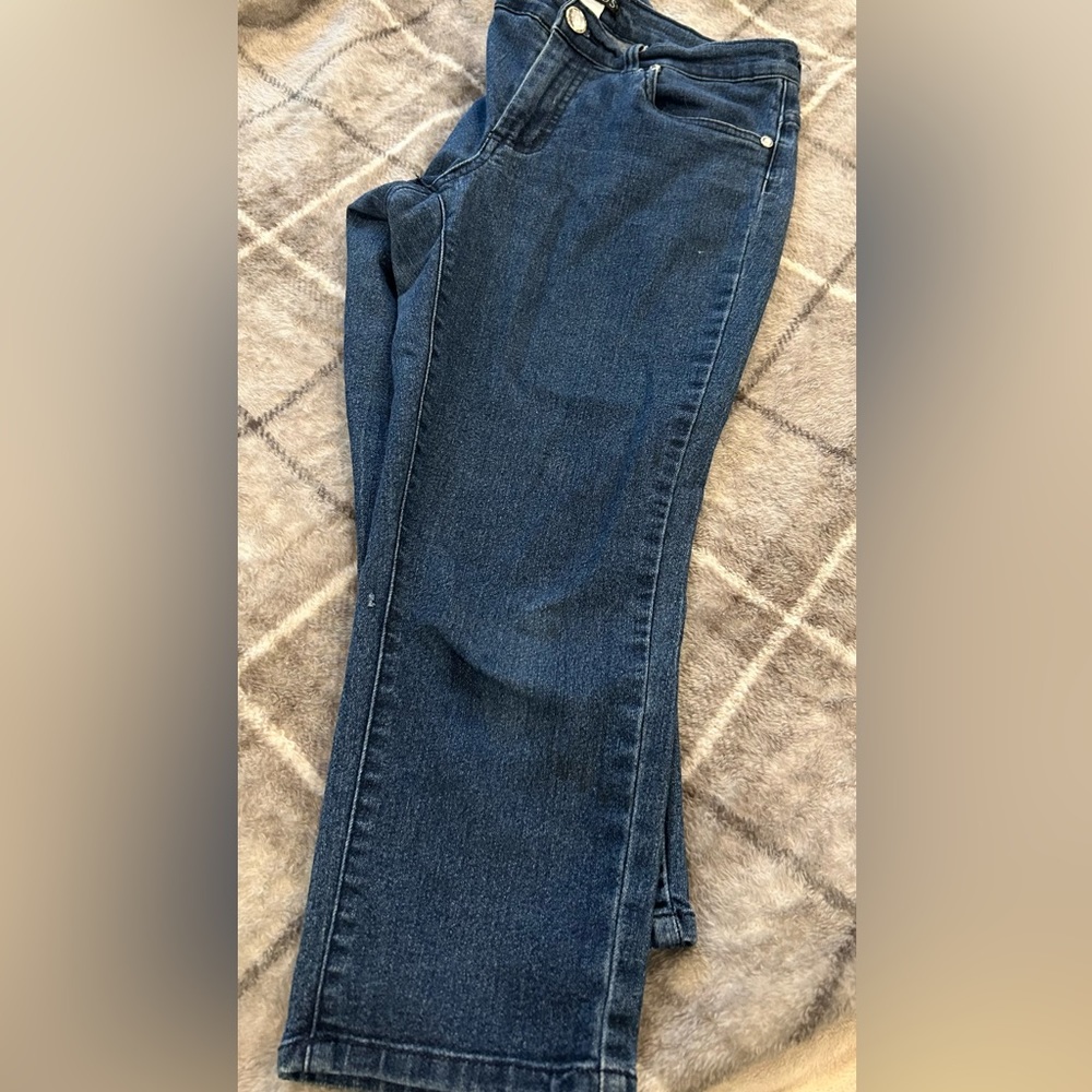 Venus size 8 short blue jeans with clear stone button.